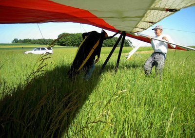 Carlos helping me untangle from a down hill - tall grass skid