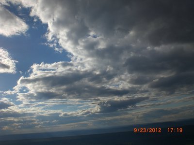 Mark C. out over the valley with a late evening sky backdrop.