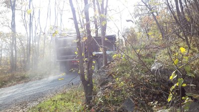 Dump truck rumbling by.