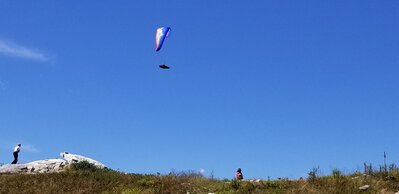 A PG pilot above launch just after I arrived.