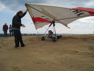 Erin listening to Andy's pre-flight briefing