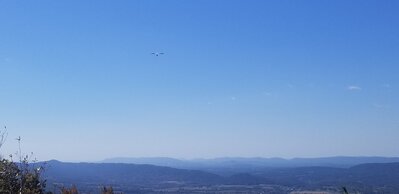 Bacil, shortly after launch. Just a dot in the blue, but I like the mtn ridges of this pic.