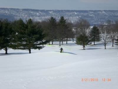 Dan lands on the driving range.