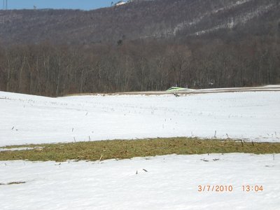 Dan about to land in the snow.