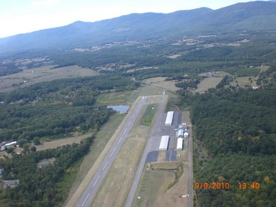 Over the airport, staging north of the runway.