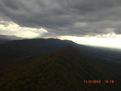 Big dark cloud shading the mountain.